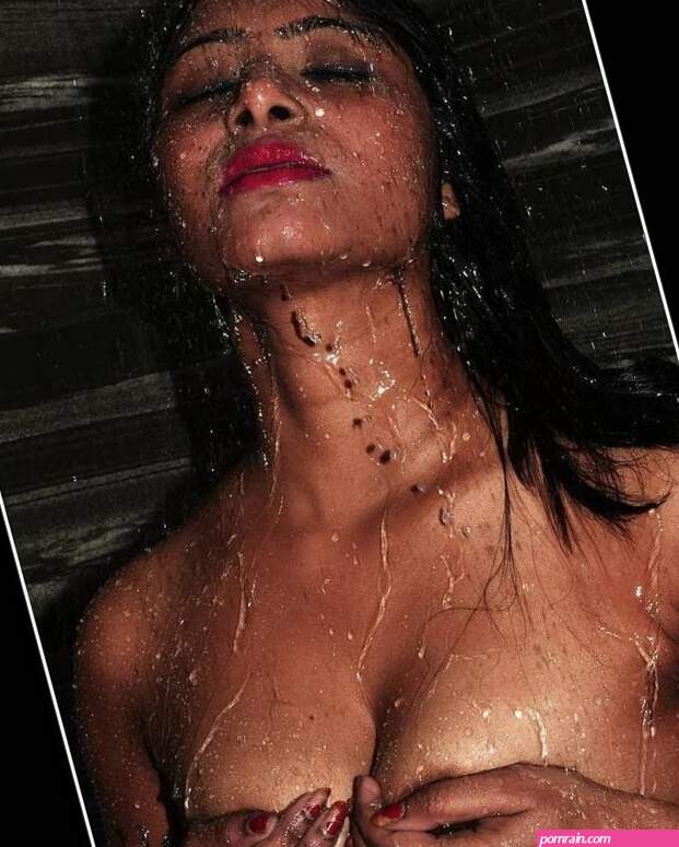 Desi model bathing topless in the shower and hiding her boobs with her hands