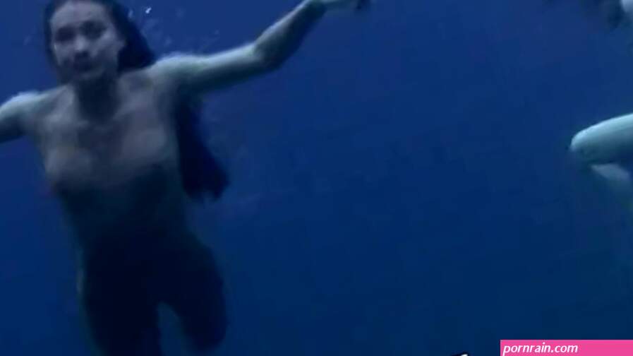 THREE GIRLS SWIMMING NUDE IN THE SEA