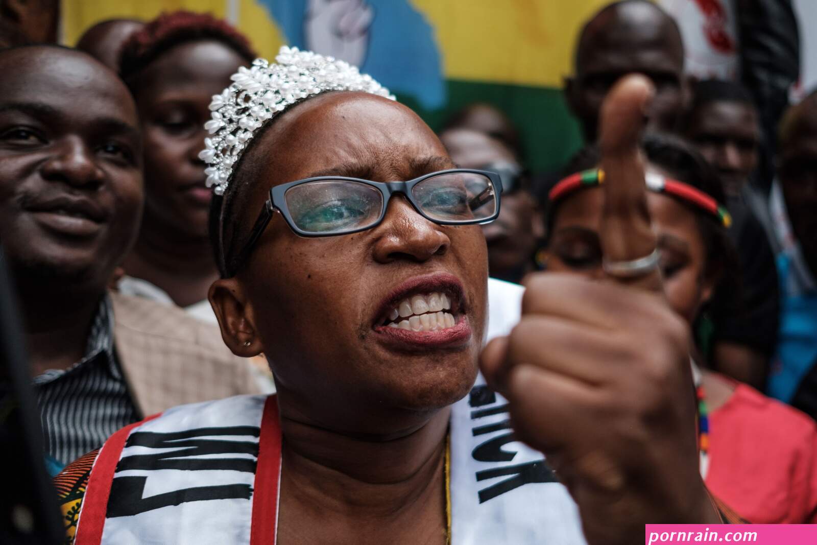 Ugandan woman stripped naked